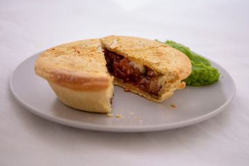 Beef pie with mushy peas