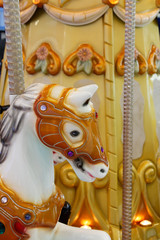 head of a wooden horse on a vintage merry-go-round