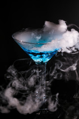 Blue Martini With Smoke on Black Background