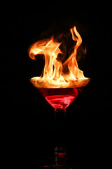fire martini on black background