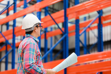 Asian Engineer man working in building factory