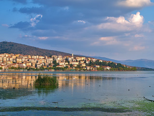 Lake Orestiada  and Kastoria city, Greece at sunset time.