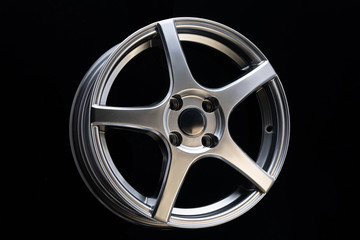 car alloy wheel, matt blac color, sport design and ligh weight, close up