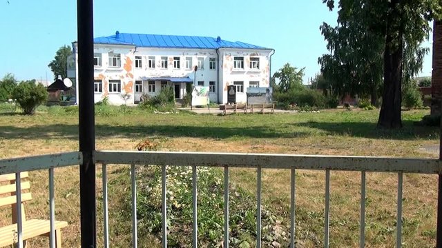 Yard of museum of Remembrance of Representatives of Russian Imperial House. Building, which contained relatives of Nicholas II before their execution. Outdoor School in Alapaevsk.