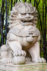 Obraz premium stone dog sculpture