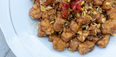 Tempe manis with chili sauce is traditional indonesian culinary food. Indonesian Street Food