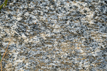 Granite rock natural textured black white background.
