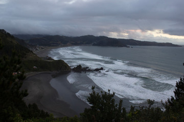 sunset on coast of sea