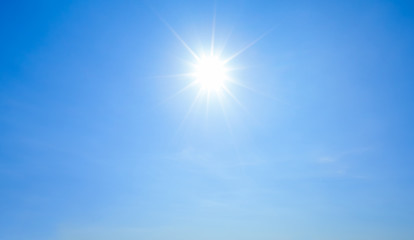 Fototapeta Shining sun with rays and clear blue sky obraz