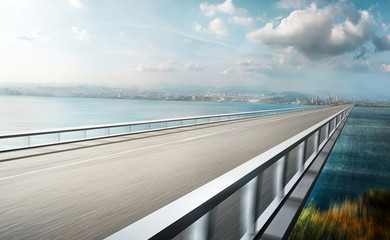 Moving forward straight empty flyover road overpass to cityscape