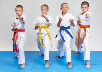 Children in karategi beats karate blows