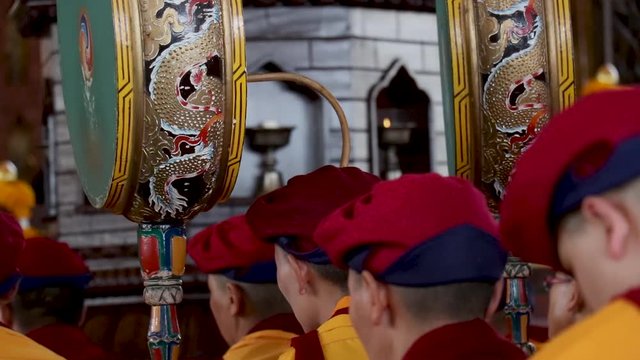 nuns playing the ritual drums inside the monastery in ladakh