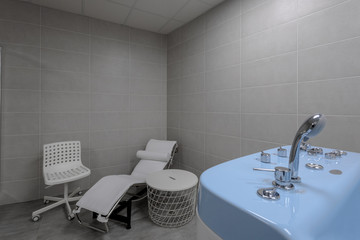 Interior of hydro massage room in modern spa salon