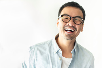 portrait happy cheerful young  asian man with perfect smilling,clean skin.posing show white teeth...
