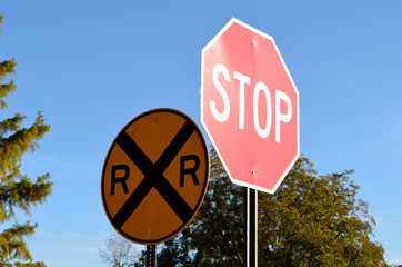 Railroad crossing sign with stop sign