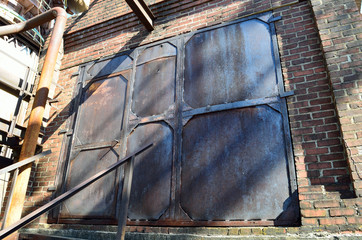Steel door in rustic industrial setting