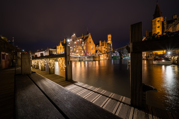 Fototapeta premium Perez de Malvenda house and Belfry of Bruges during the Christmas period