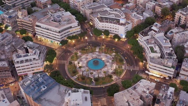 Dizengoff square in tel Aviv, Israel, at night, 4k aerial drone view