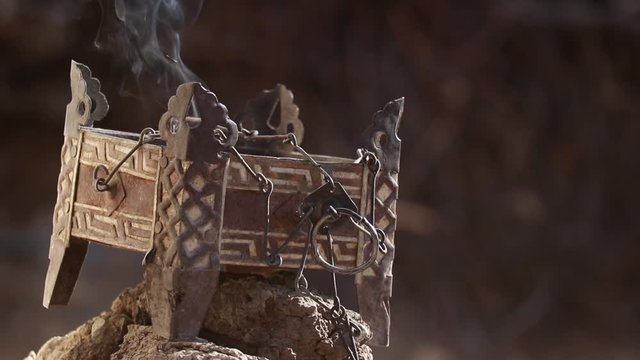 metal incense burner at the entrance of a traditional ladakhi house 