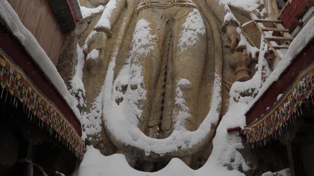 rock carved statue of buddha on srinagar leh highway
