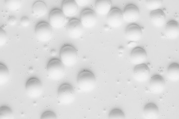 White liquid paint bubbles texture as abstract background.