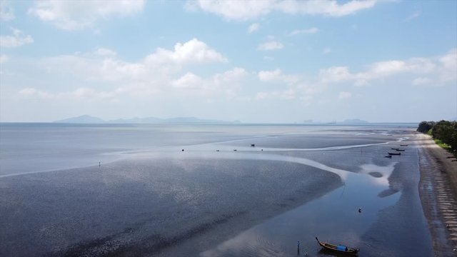 Aerial Shot Revolving boat on the beach from Thailand