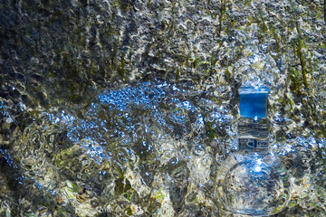 Glass flask with clear water.