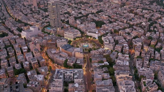 Dizengoff square in tel Aviv, Israel, at night, 4k aerial drone view