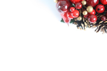 Detail of  a beautiful winter holidays decoration wreath isolated on white