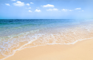 Tropical white sand beach and soft calm sea waves