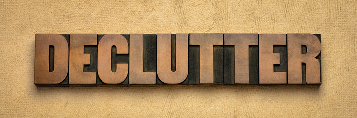 declutter word  abstract in wood type