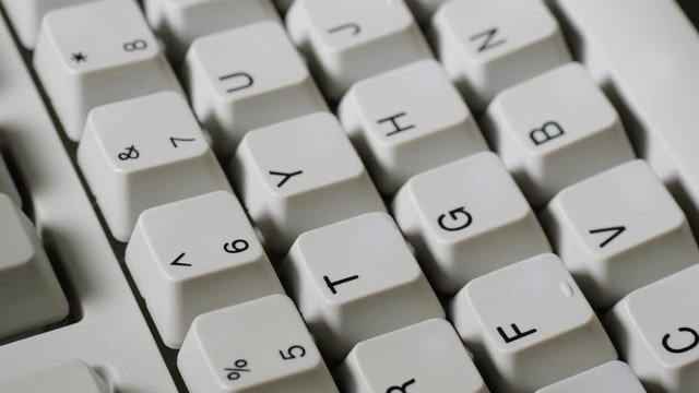 Finger presses nomber 6 or ^ button on keyboard