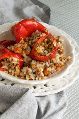 Ready for eat stuffed red peppers with minced meat, rice and vegetables