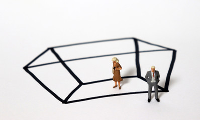 Miniature people and a rectangle of black solid lines. The concept of the glass ceiling.