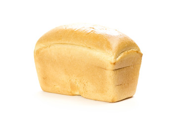 A loaf of fresh bread. Close up. Isolated on white background
