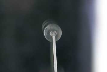 The suction Cup is glued to the glass. Close up