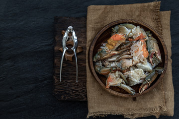 Fish sauce-fermented Horse crab and Sea Crab Egg Pickled in Fish Sauce in wooden bowl.