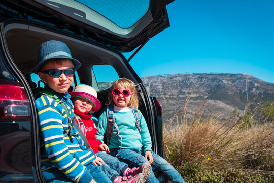 Happy Kids-boy And Girls- Enjoy Travel By Car In Moutains, Family Vacation