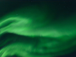 Naklejka na ściany i meble Aurora at night in the sky in the north.