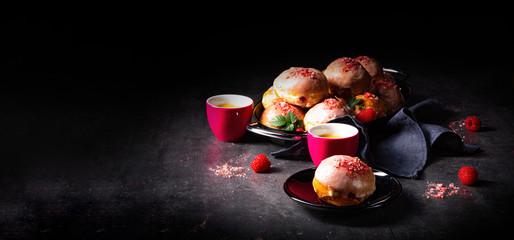 Delicious Berlin donuts filled with raspberry jam - obrazy, fototapety, plakaty
