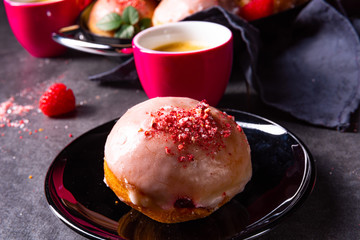 Delicious Berlin donuts filled with raspberry jam