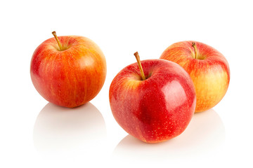 three ripe red apples