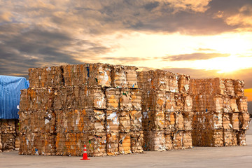 Stack of paper waste before shredding at recycling plant