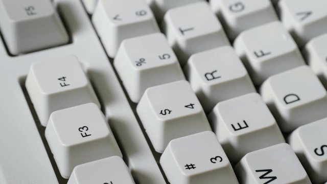 Finger presses F3 button on keyboard