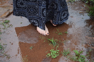 Walking barefoot in the rain