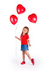 Happy little girl with red balloons on white background