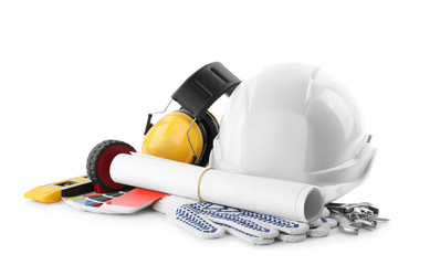 Fototapeta premium Different construction tools and hard hat isolated on white