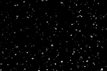 White snow falling down on black background