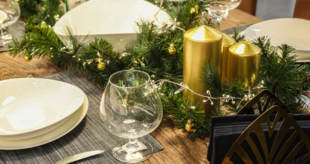 Christmas decorations golden candles and balls on white background.