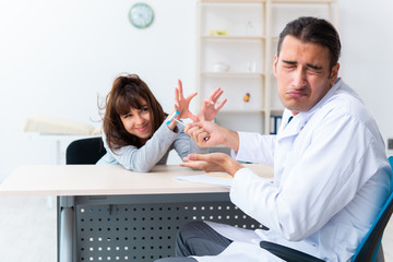 Mentally ill woman patient during doctor visit